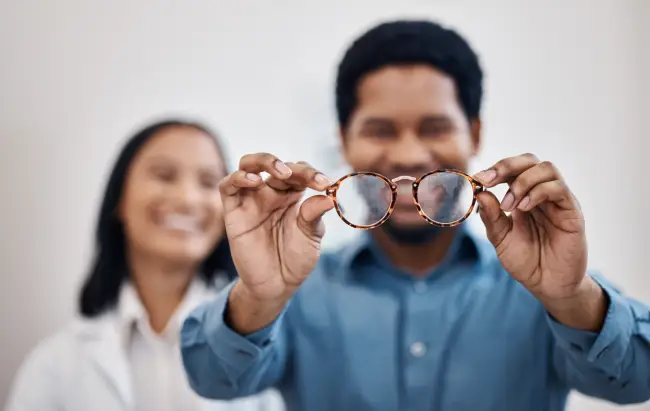 Happy patient with new glasses Happy patient with new glasses